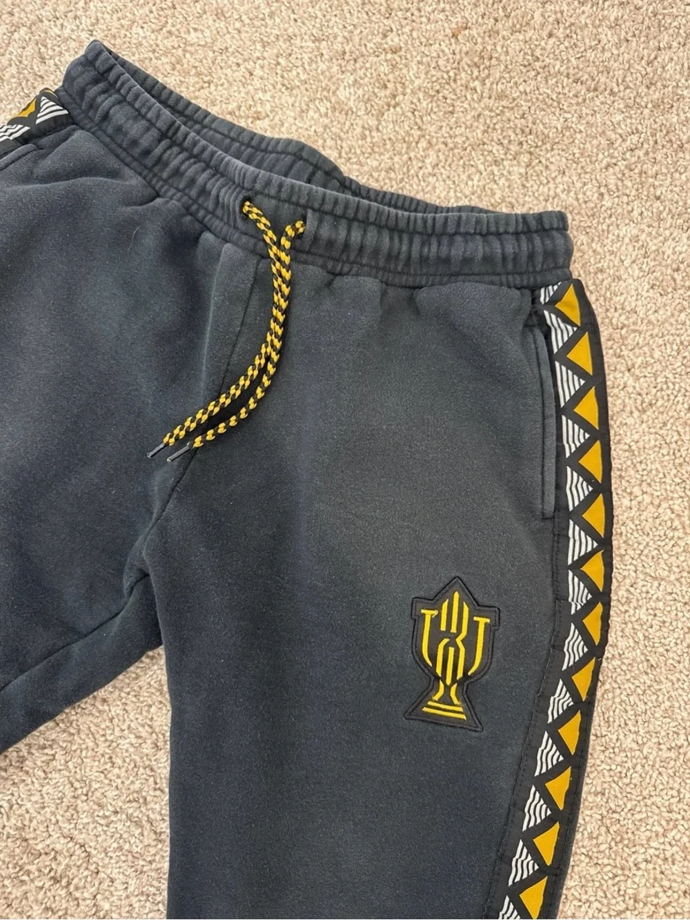 Mitchell & Ness X Trophy Room Black Sweatpants with Yellow Accent
